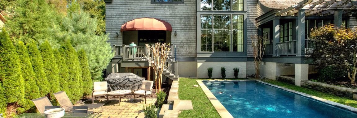 residential backyard featuring a swimming pool