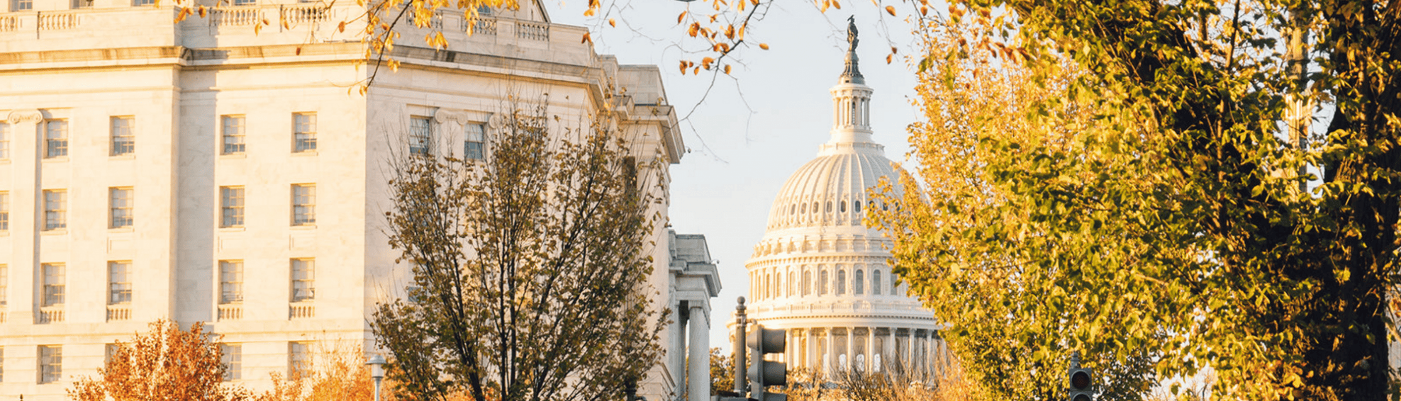 Longworth House Office Building in Washington D.C., with a glimpse of the U.S. Capitol Building in the background. 