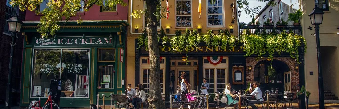 a charming street scene in Old Town Alexandria, Virginia, specifically featuring King Street. 