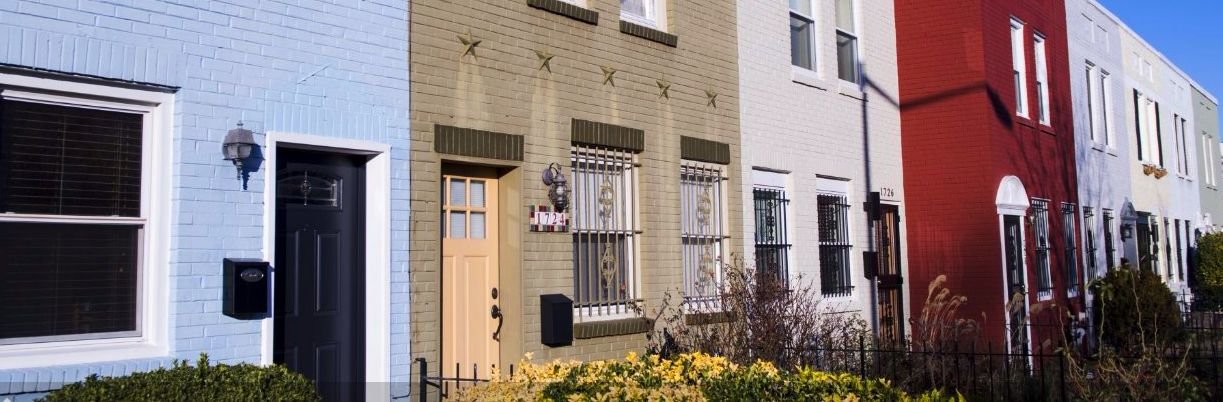 a row of colorful townhouses in the Kingman Park neighborhood of Washington, D.C.